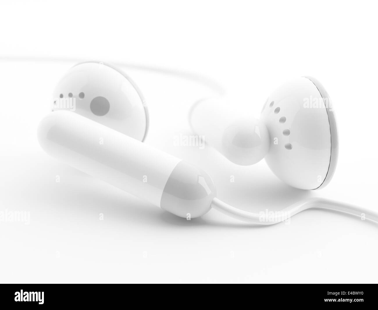 Modern light earphones on a white background Stock Photo