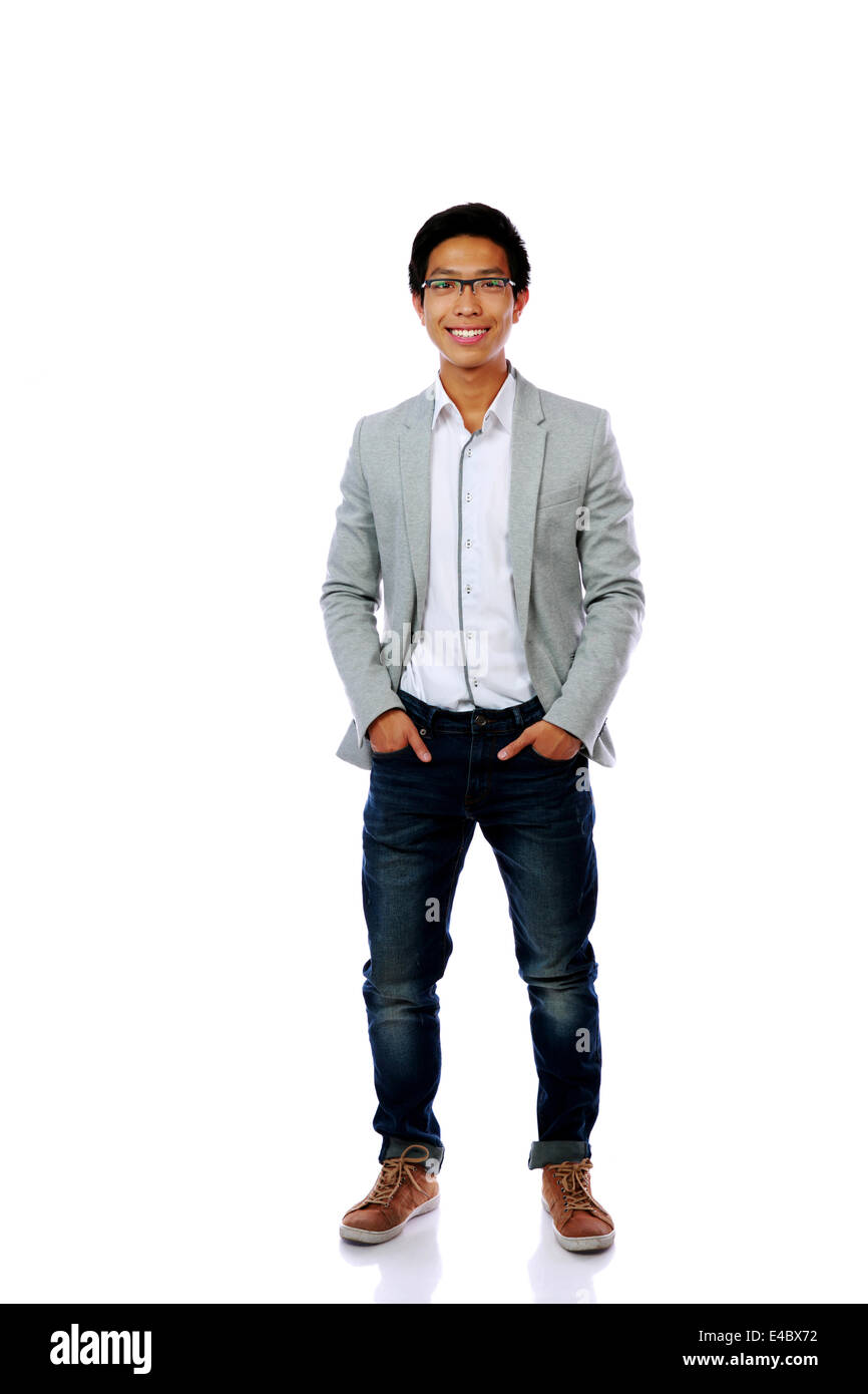Full length portrait of smiling asian man isolated on a white ...