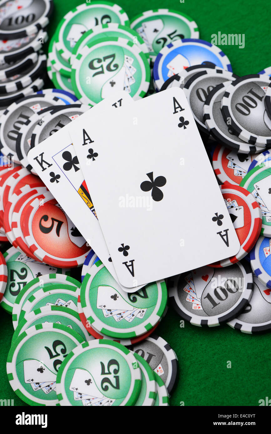 Gaming chips and cards on the green cloth Stock Photo Alamy