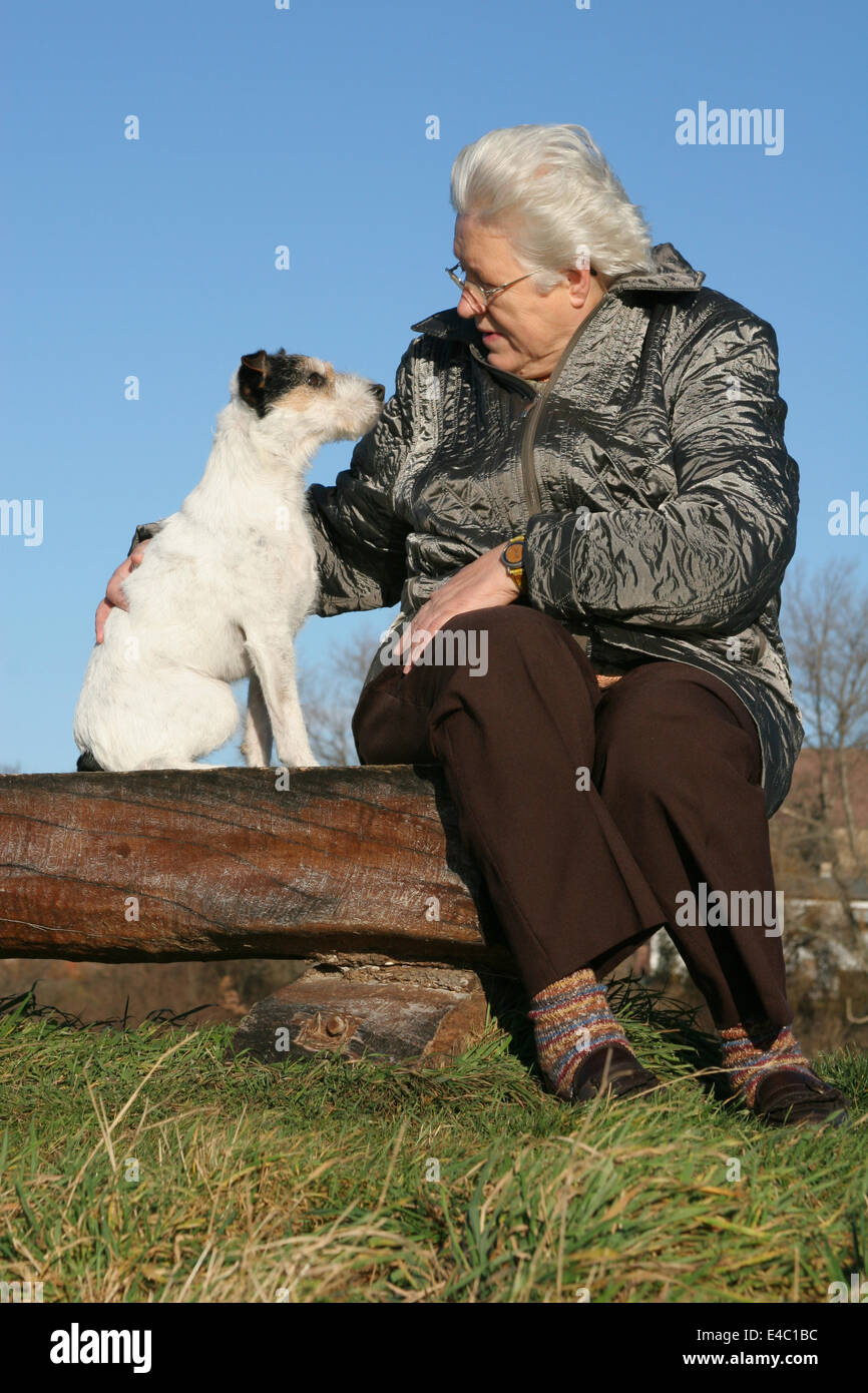Senior with dog Stock Photo - Alamy