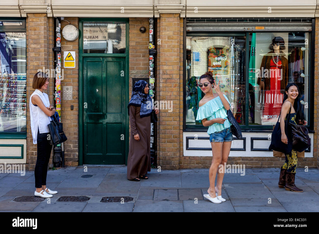 Tourists Shopping In Brick Lane, London, England Stock Photo