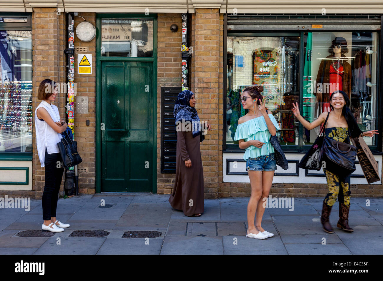 Tourists Shopping In Brick Lane, London, England Stock Photo
