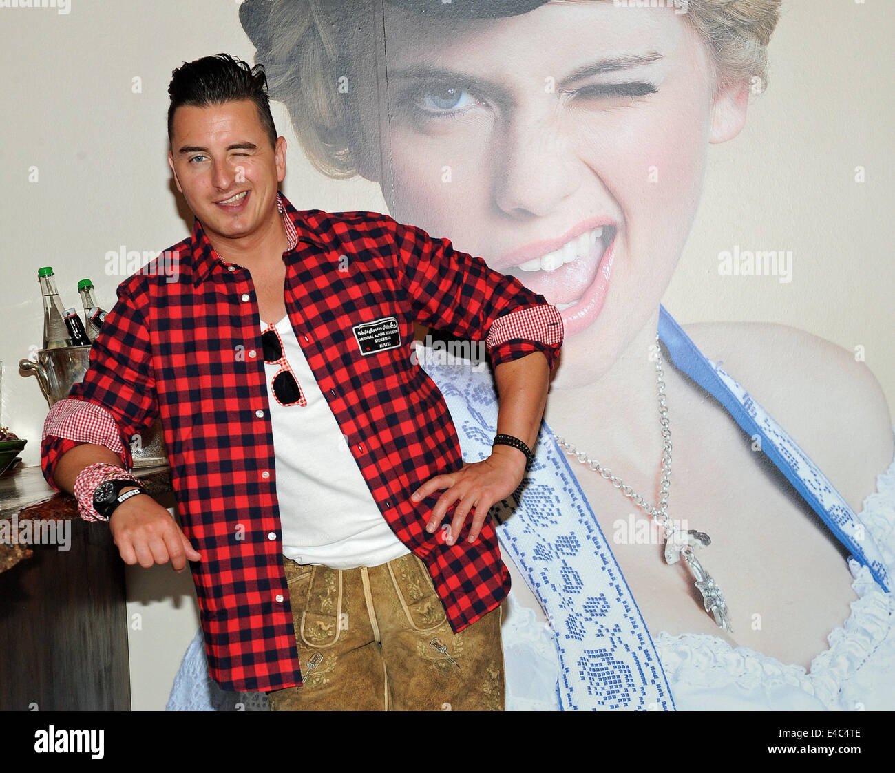 Austrian folk singer Andreas Gabalier presents his first traditional  national costume collection 'Volks Rock 'n' Roll Andreas Gabalier by  Meindl' in a store in Munich, Germany, 08 July 2014. Photo: URSULA  DUEREN/DPA