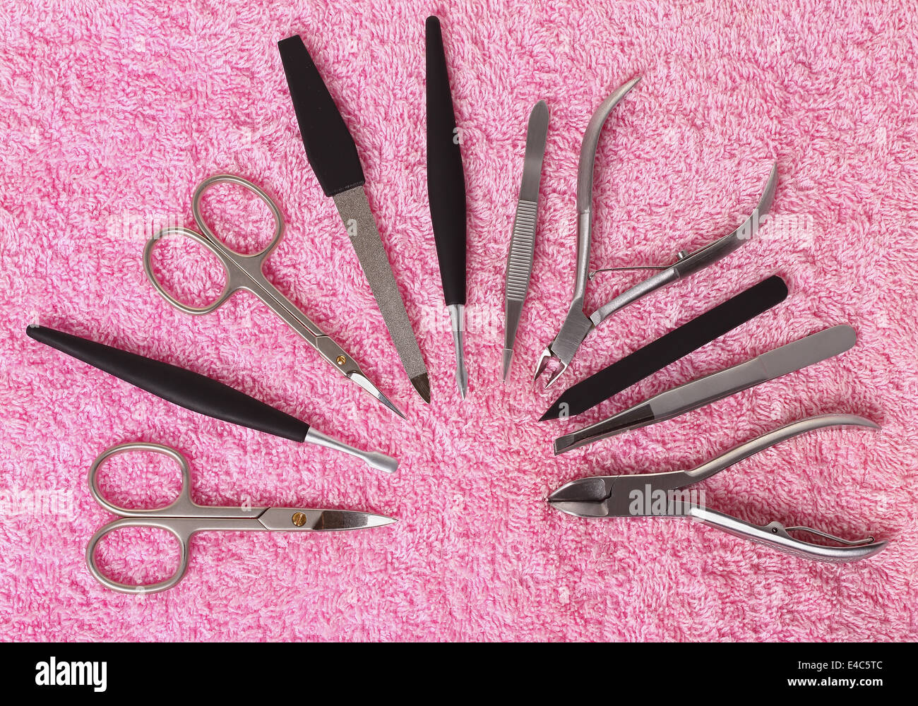 Set of manicure instruments, on a pink background Stock Photo - Alamy