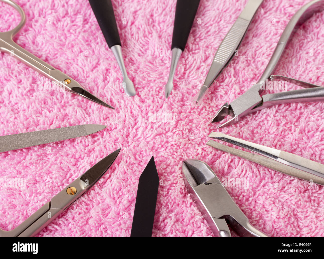 Set of manicure instruments, on a pink background Stock Photo - Alamy