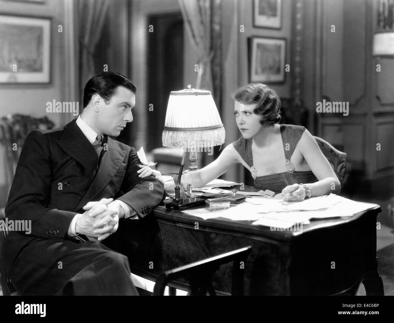 George Brent, Ruth Catterton, on-set of the Film, 'The Crash', 1932 Stock Photo