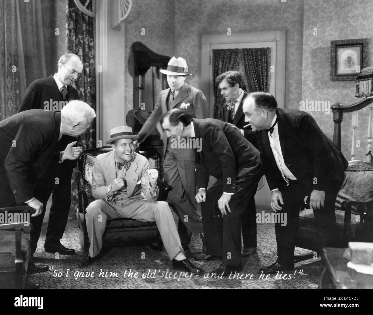 Jack Oakie (C), Richard Gallagher (Hat), Charles Sellon (2nd R), Henry Roquemore (R), on-set of Film, 'The Social Lion', 1930 Stock Photo