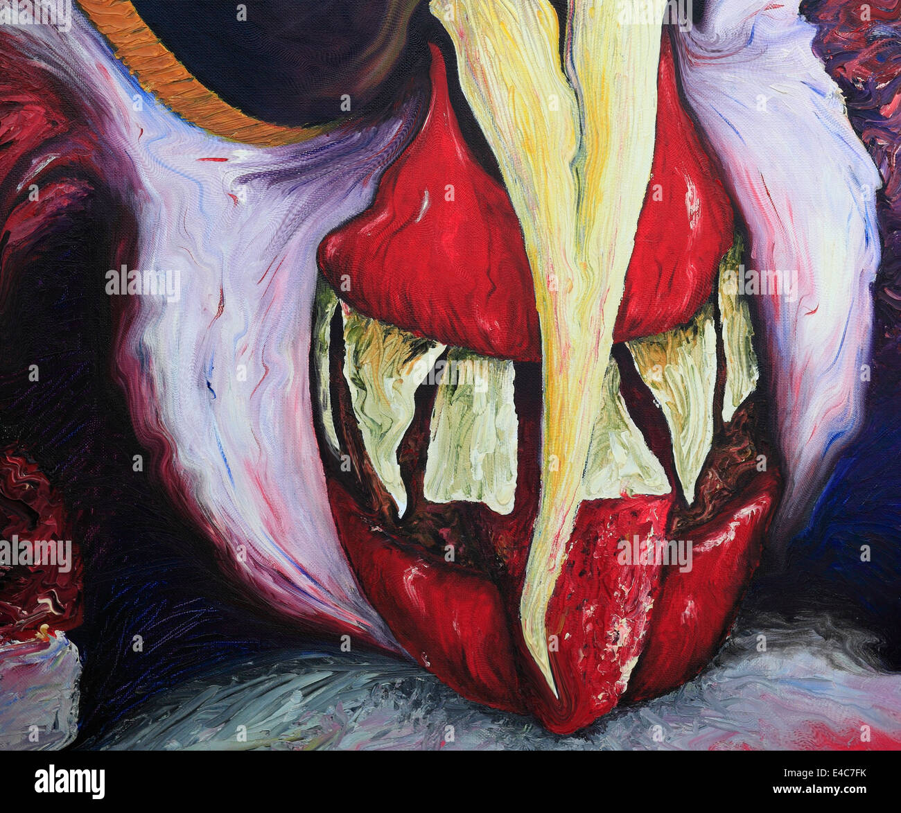 Photograph of a painting of a demon-like face. Stock Photo