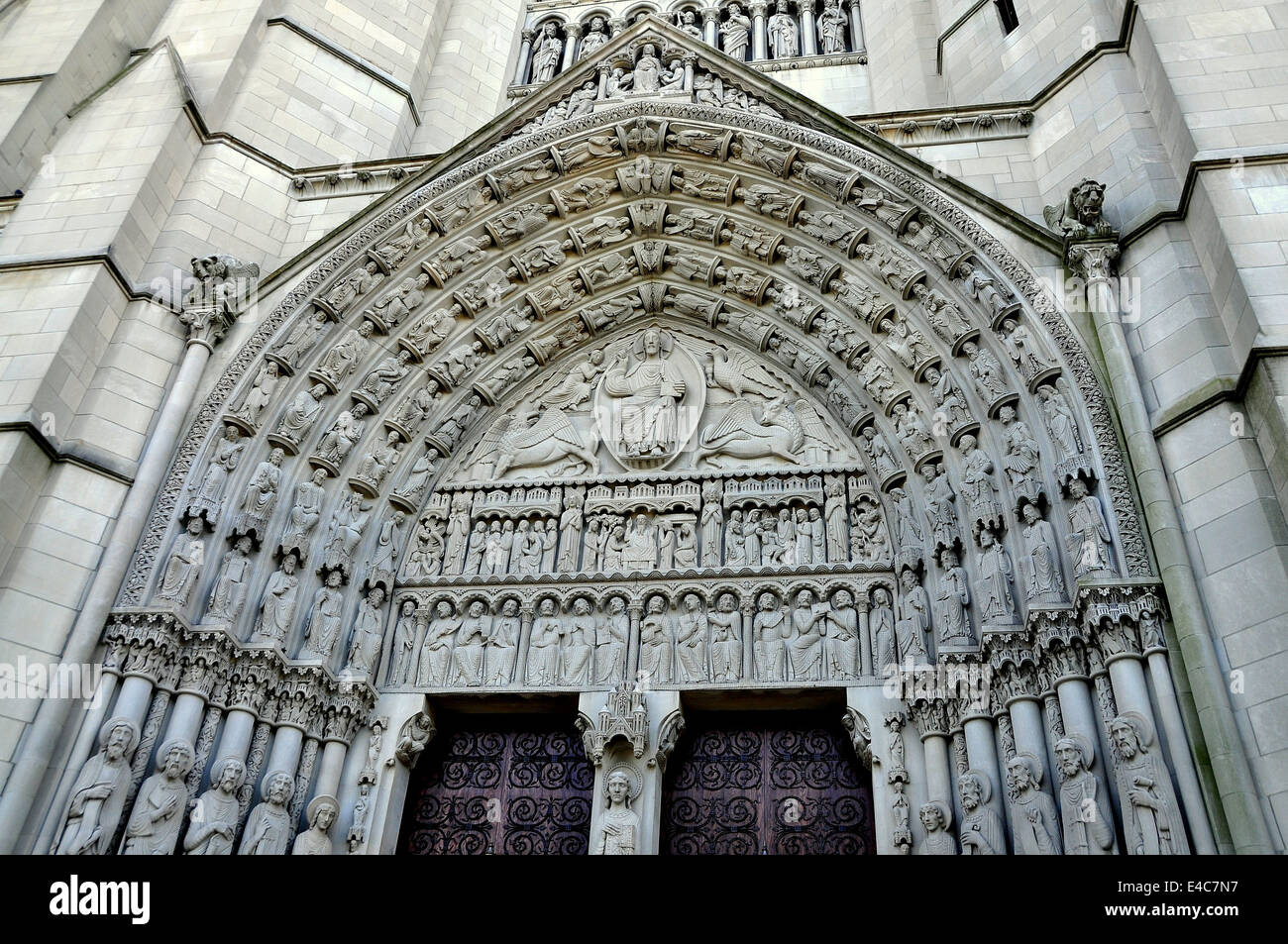 NYC: Neo-gothic entrance doors and Christ in Majesty tympanum at ...