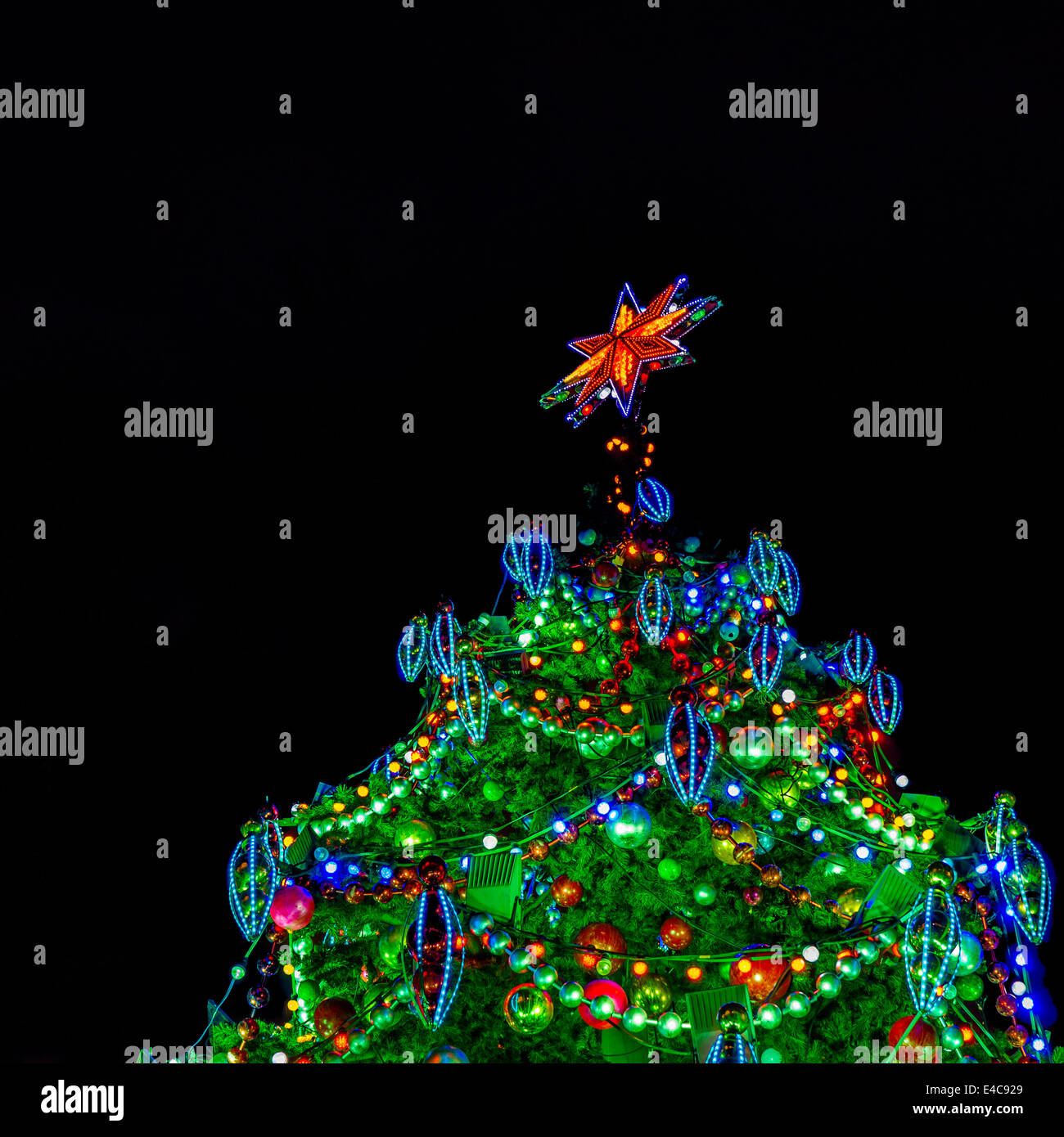 artificial christmas tree top decorated with a lot of lights balls icicles - Christmas Light Balls For Trees artificial christmas tree top decorated with a lot of lights balls icicles - Christmas Light Balls For Trees