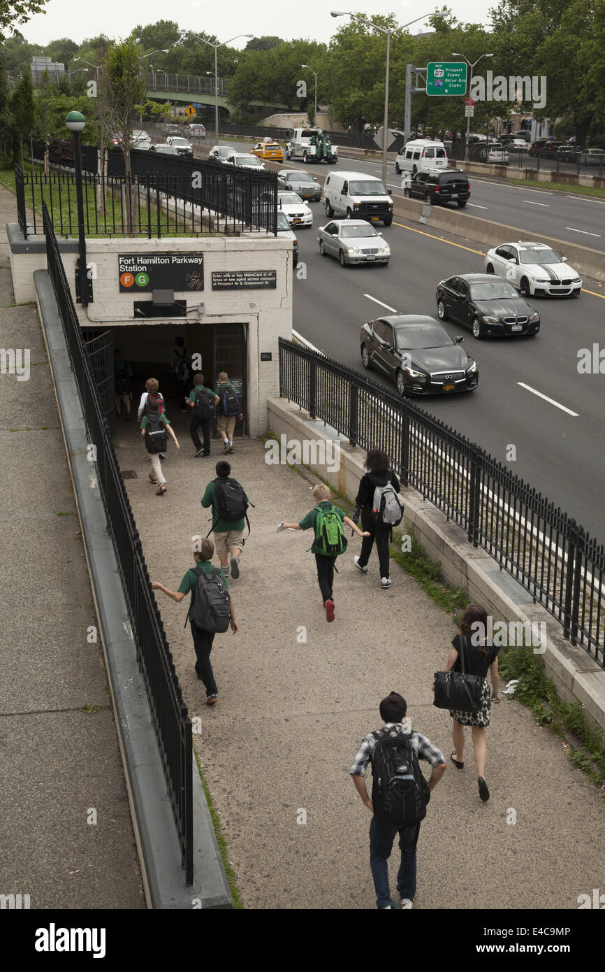 Students walk from nearby school to the Fort Hamilton stop on the F train in Windsor Terrace, Brooklyn, NY. Stock Photo