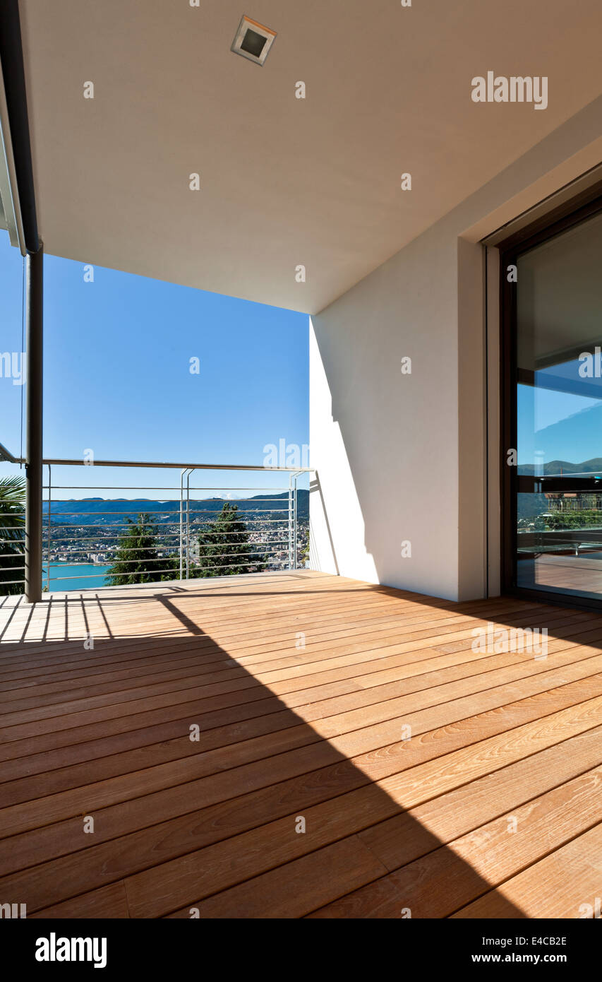 Modern apartment, balcony overlooking the lake Stock Photo - Alamy