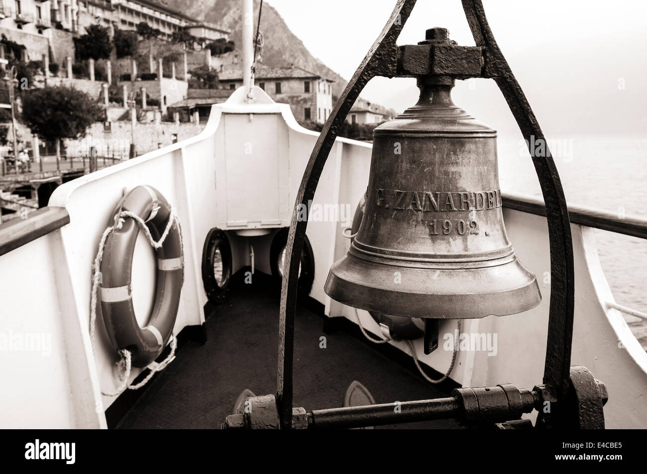 Bell in the bow of a boat crossing Lake Garda, Italy Stock Photo Alamy