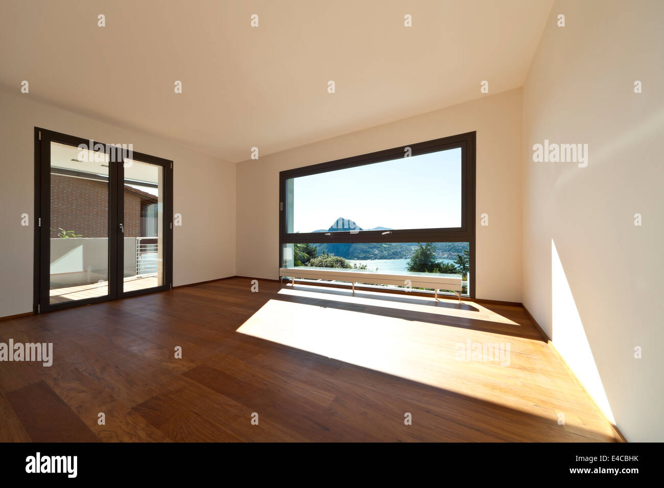 Picture of Modern apartment, large room with windows Stock Photo - Alamy