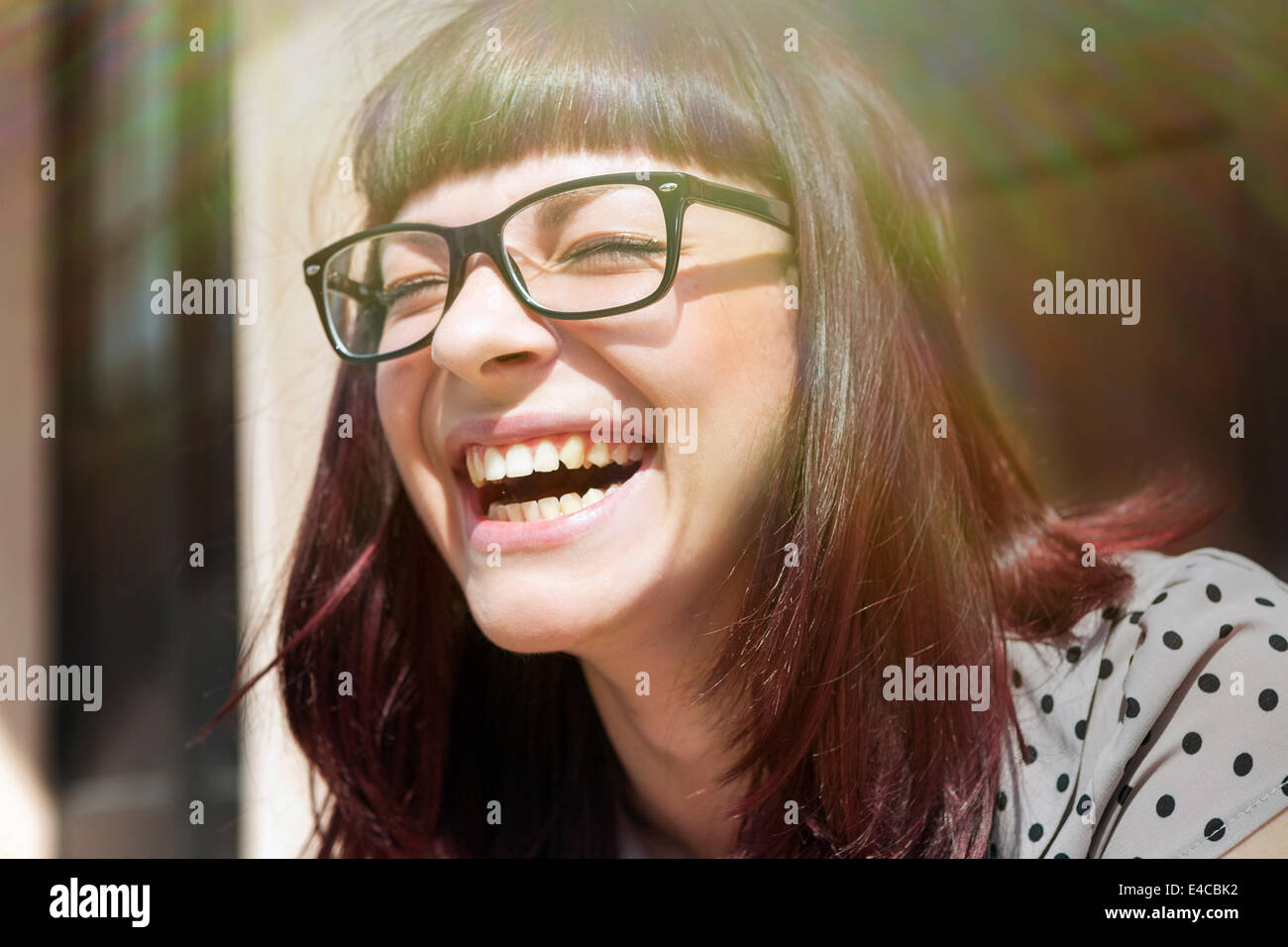 Young woman laughing with joy, Osijek, Croatia Stock Photo
