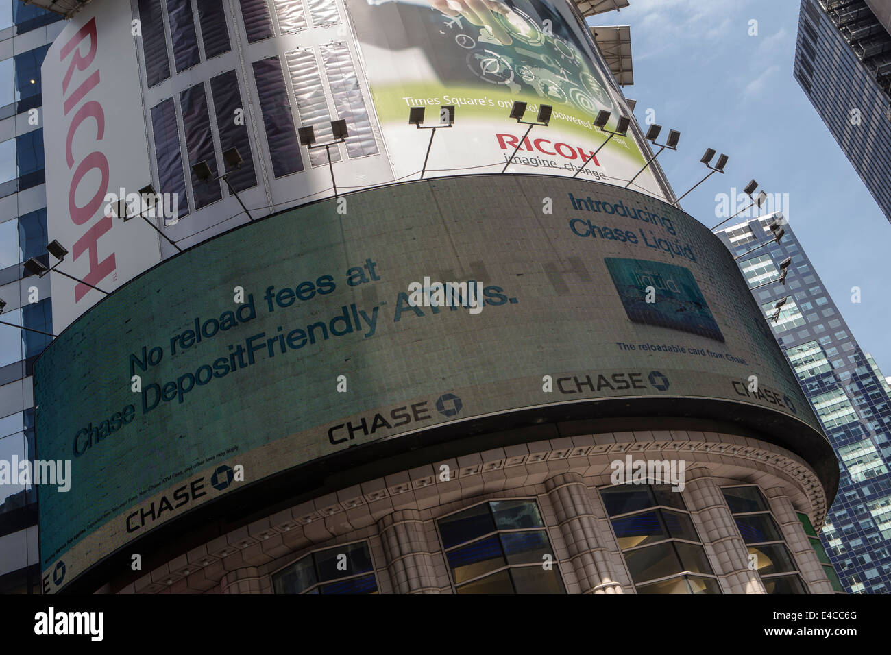 An electronic billboard advertisement shows an ad for Chase Liquid Reloadable Card in the New York City borough of Manhattan, NY Stock Photo