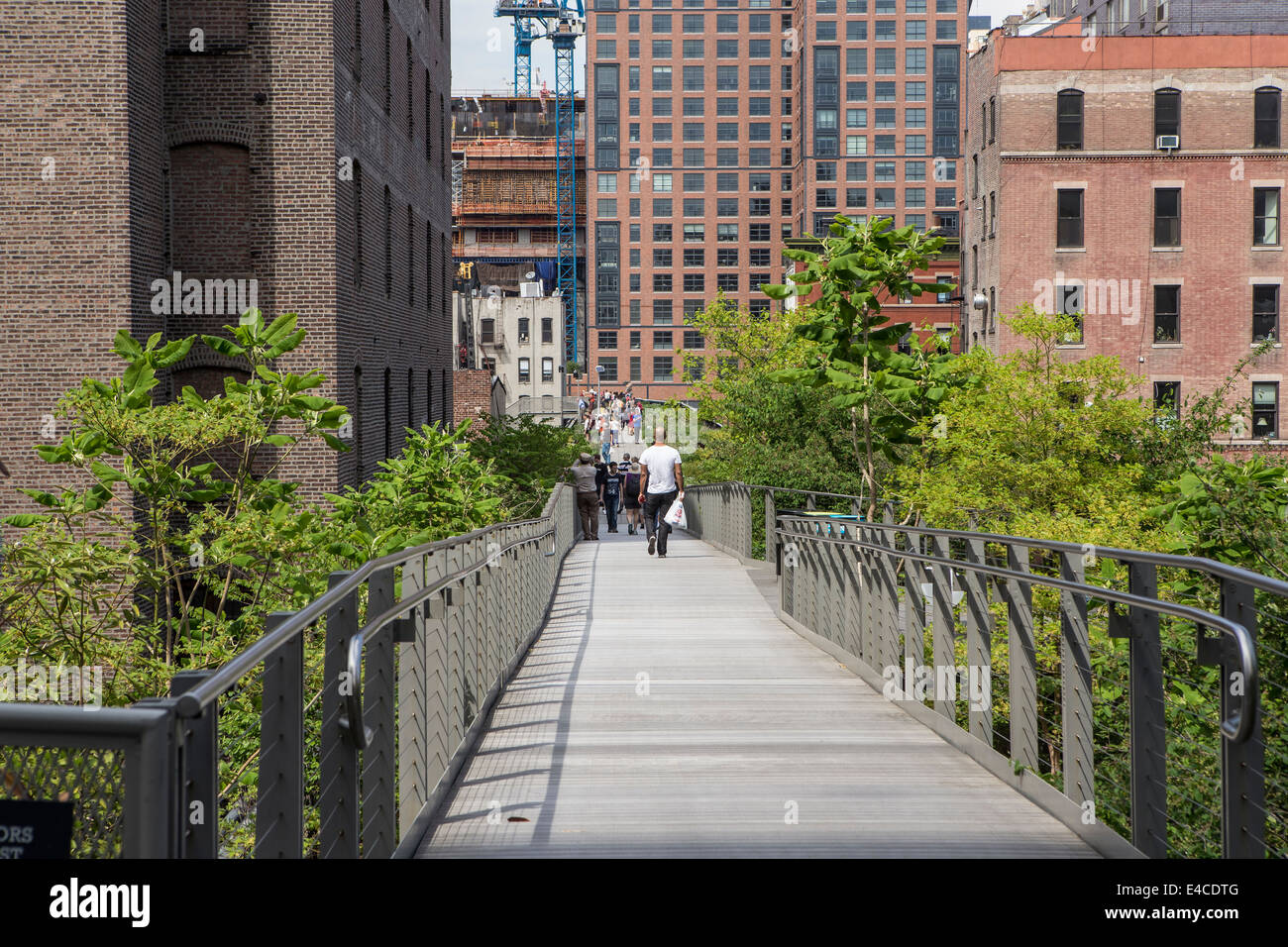 Pedestrians walk on High Line Park in the New York City borough of ...