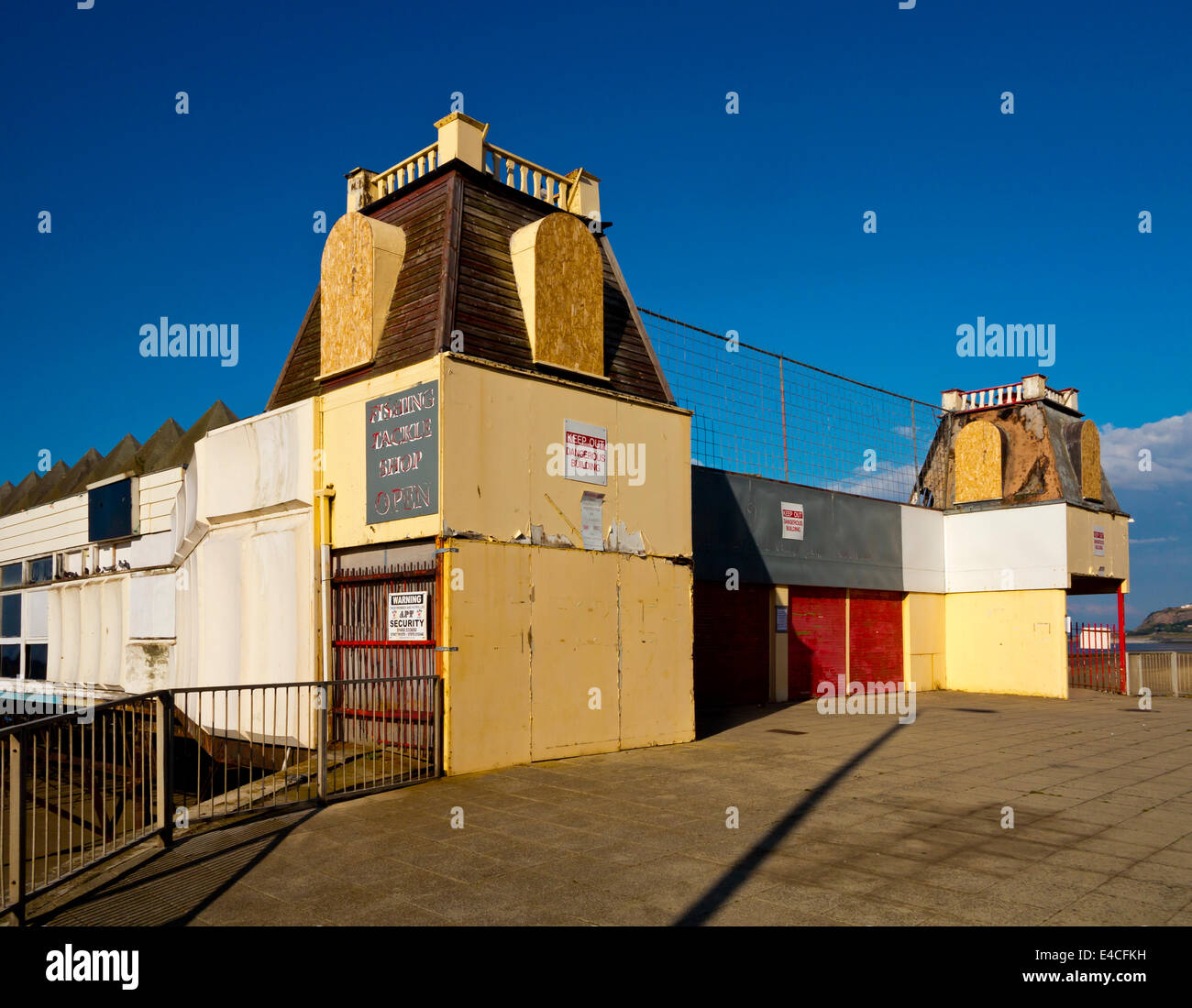 Victoria Pier in Colwyn Bay North Wales UK which opened 1900 but has been unused for many years and threatened with demolition Stock Photo
