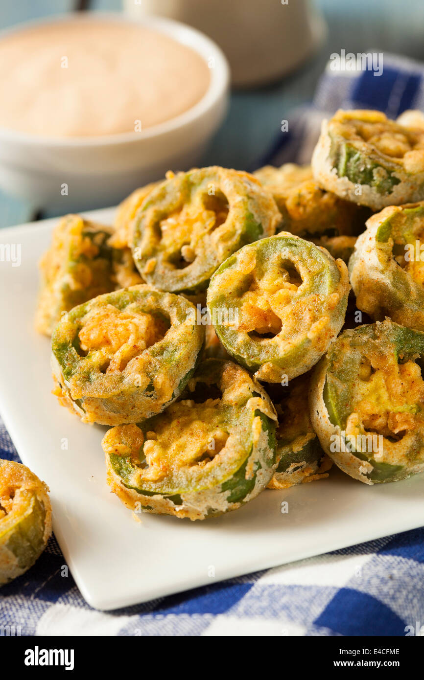 Unhealthy Fried Jalapeno Slices with Dipping Sauce Stock Photo