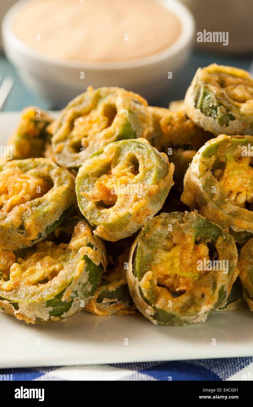Unhealthy Fried Jalapeno Slices with Dipping Sauce Stock Photo
