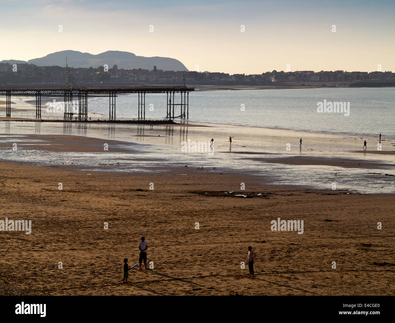 The beach and pier at Colwyn Bay in Conwy a seaside resort on the North Wales coast in the UK Stock Photo