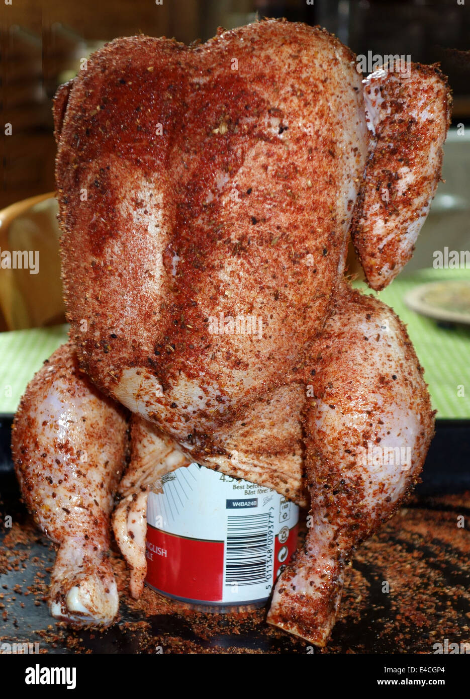 Beer Can Chicken ready for roasting in oven, England Stock Photo Alamy