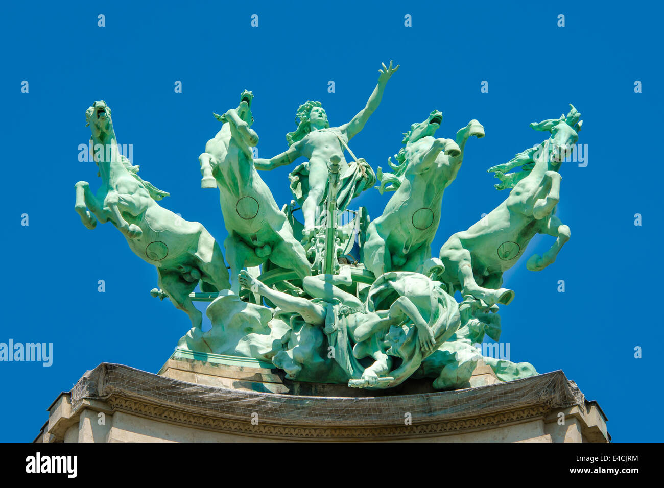 France, Paris: famous monuments statue of Grand Palais; blue sky and green bronze horses jumping from the palace roof. Stock Photo