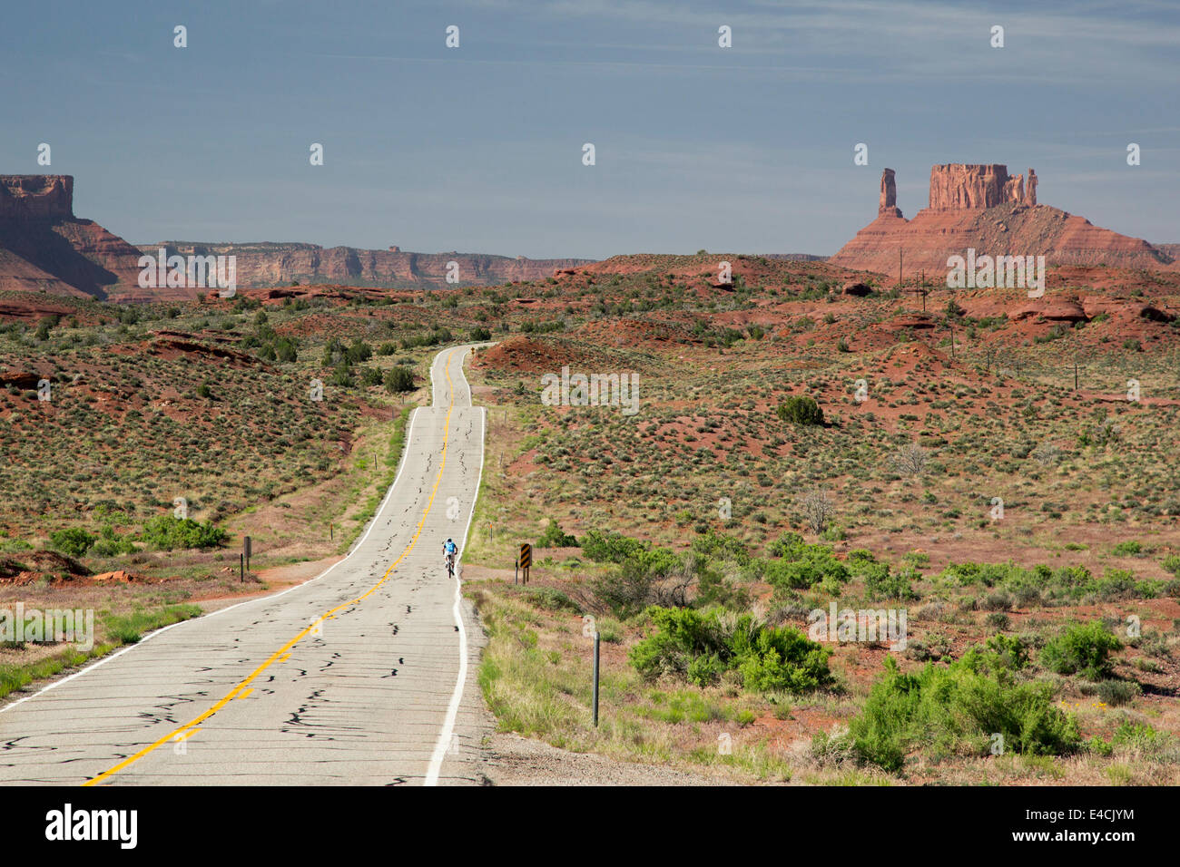 Moab, Utah - A bicycle rider on Utah Route 128. Stock Photo