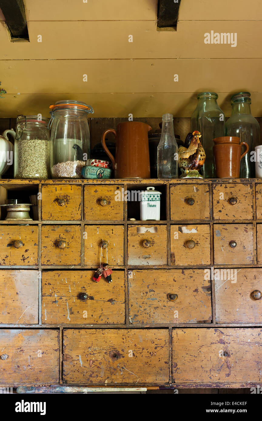 Old chemist drawers  used for storage in country kitchen Stock Photo