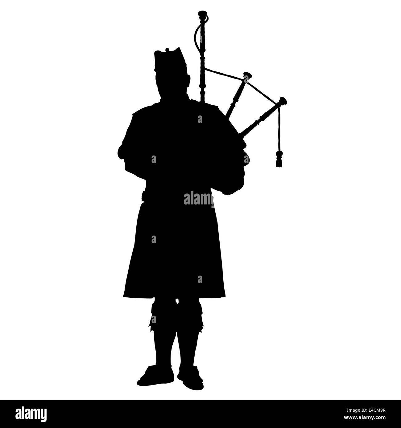 A black silhouette of a Scottish piper playing the bagpipes Stock Photo