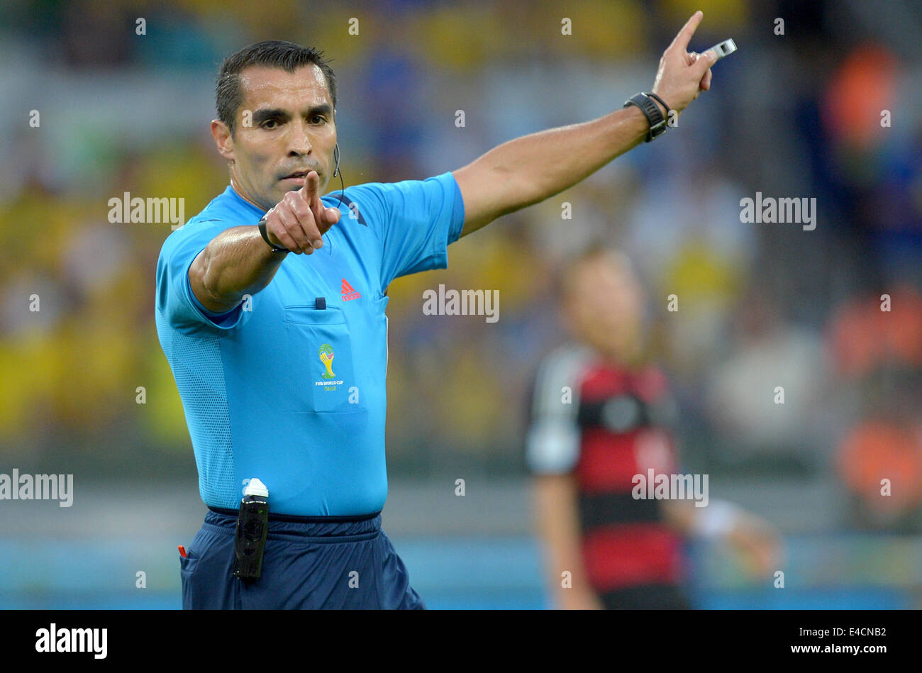 Belo Horizonte, Brazil. 08th July, 2014. Referee Marco Rodriguez of Mexico gestures during the FIFA World Cup 2014 semi-final soccer match between Brazil and Germany at Estadio Mineirao in Belo Horizonte, Brazil, 08 July 2014. Photo: Thomas Eisenhuth/dpa/Alamy Live News Stock Photo