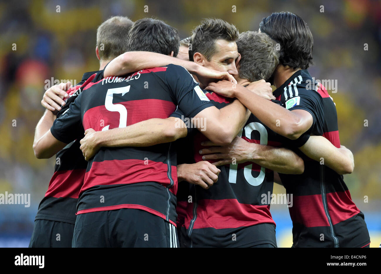 Belo Horizonte, Brazil. 08th July, 2014. Miroslav Klose (C) of Germany celebrates with his teammmates after scoring 0-2 goal during the FIFA World Cup 2014 semi-final soccer match between Brazil and Germany at Estadio Mineirao in Belo Horizonte, Brazil, 08 July 2014. Photo: Marcus Brandt/dpa/Alamy Live News Stock Photo