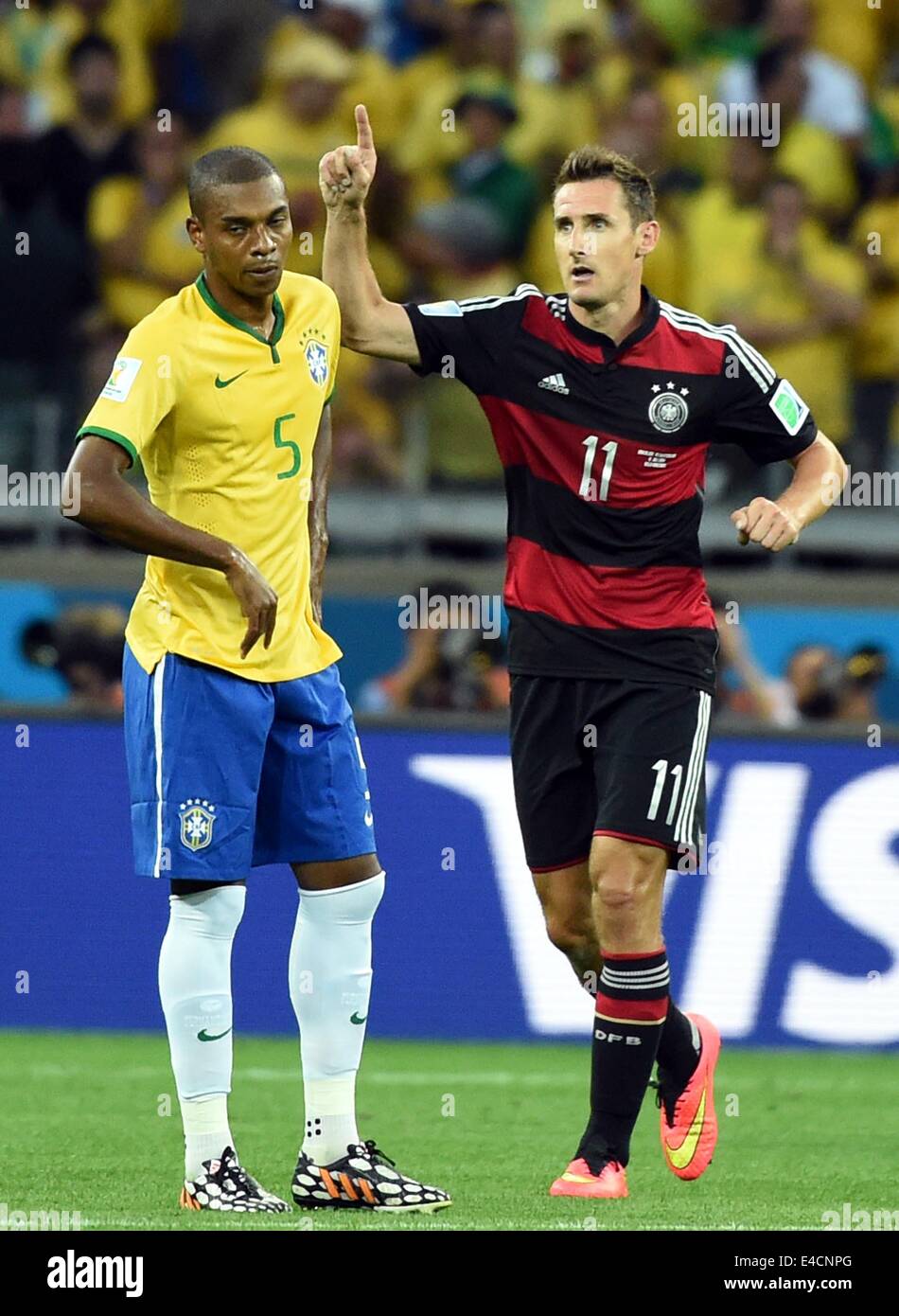 Belo Horizonte, Brazil. 8th July, 2014. Germany's Miroslav Klose (R) celebrates after scoring a goal during a semifinal match between Brazil and Germany of 2014 FIFA World Cup at the Estadio Mineirao Stadium in Belo Horizonte, Brazil, on July 8, 2014. Credit:  Liu Dawei/Xinhua/Alamy Live News Stock Photo