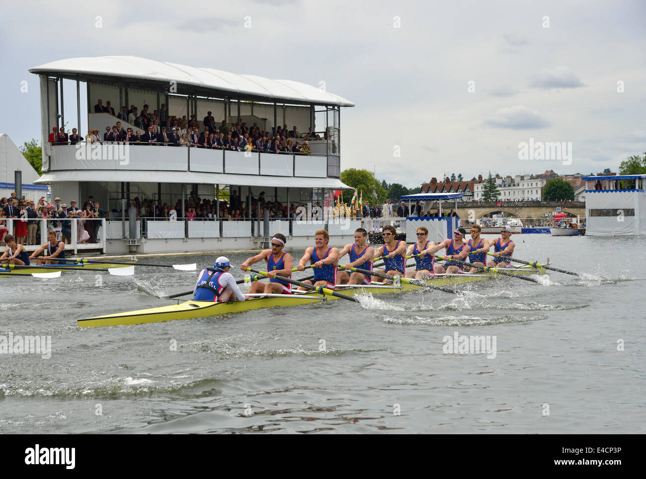 Sport Imperial Boat Club in foreground taking part in the Thames Challenge Cup at the Henley Royal Regatta 2014,Oxfordshire,UK Stock Photo