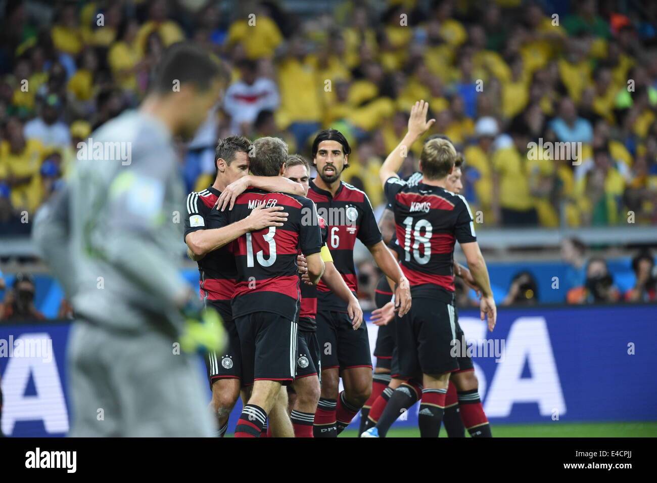 Belo Horizonte, Brazil. 08th July, 2014. Miroslav Klose (L-R) of Germany celebrates with his teammmates Thomas Mueller, Philipp Lahm, Sami Khedira and Toni Kroos after scoring 0-2 goal during the FIFA World Cup 2014 semi-final soccer match between Brazil and Germany at Estadio Mineirao in Belo Horizonte, Brazil, 08 July 2014. Photo: Marcus Brandt/dpa/Alamy Live News Stock Photo