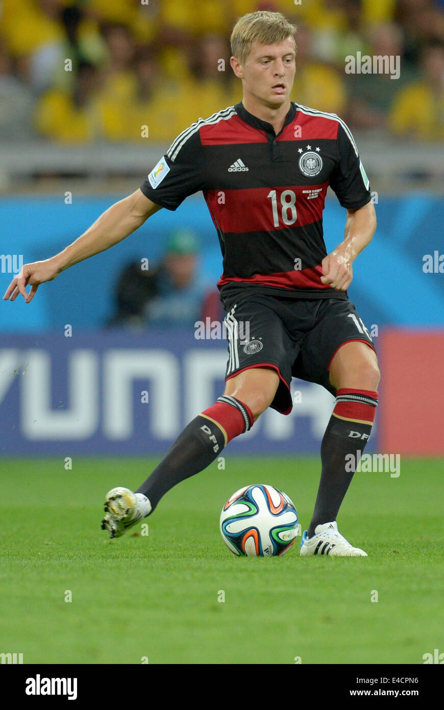Belo Horizonte, Brazil. 08th July, 2014. Germany's Toni Kroos controls the ball during the FIFA World Cup 2014 semi-final soccer match between Brazil and Germany at Estadio Mineirao in Belo Horizonte, Brazil, 08 July 2014. Photo: Thomas Eisenhuth/dpa/Alamy Live News Stock Photo