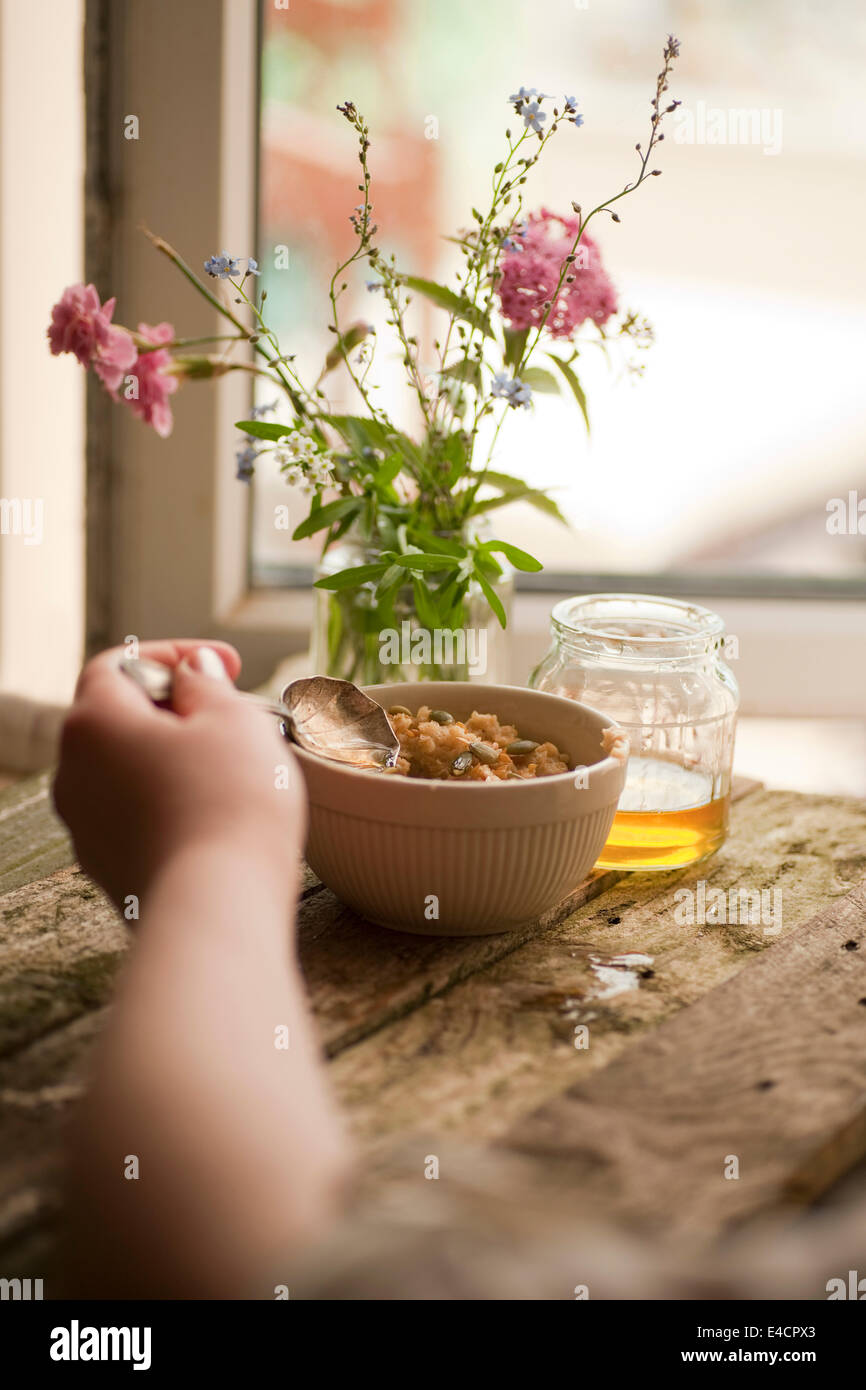 Porridge with Sunflower Seeds and a Light Syrup Stock Photo Alamy