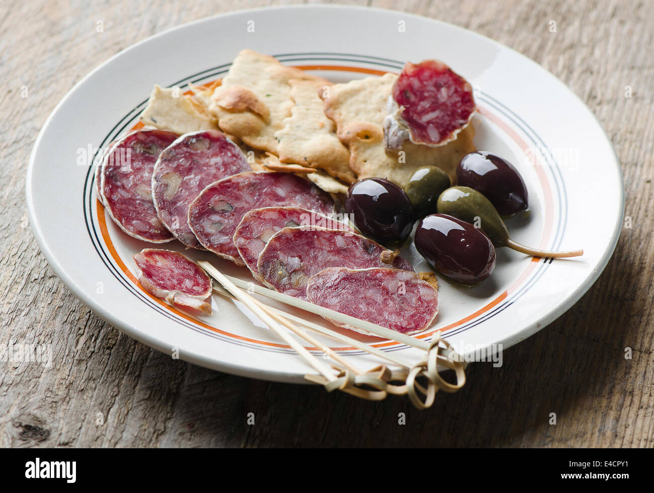 Salami on a white plate Stock Photo