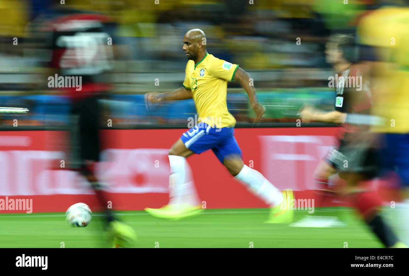 Belo Horizonte, Brazil. 08th July, 2014. Brazil's Maicon controls the ball during the FIFA World Cup 2014 semi-final soccer match between Brazil and Germany at Estadio Mineirao in Belo Horizonte, Brazil, 08 July 2014. Photo: Marcus Brandt/dpa/Alamy Live News Stock Photo
