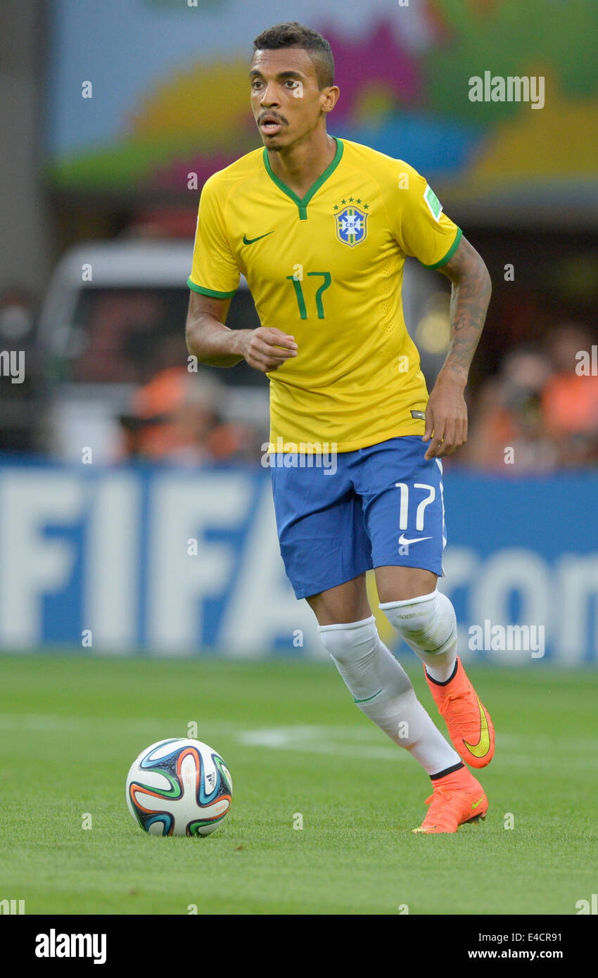 Belo Horizonte, Brazil. 08th July, 2014. Luiz Gustavo of Brazil in action during the FIFA World Cup 2014 semi-final soccer match between Brazil and Germany at Estadio Mineirao in Belo Horizonte, Brazil, 08 July 2014. Photo: Thomas Eisenhuth/dpa/Alamy Live News Stock Photo