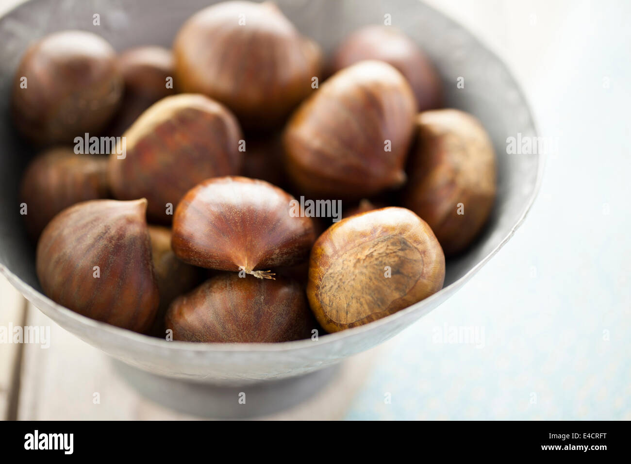 French Chestnuts in Metal Bowl Stock Photo