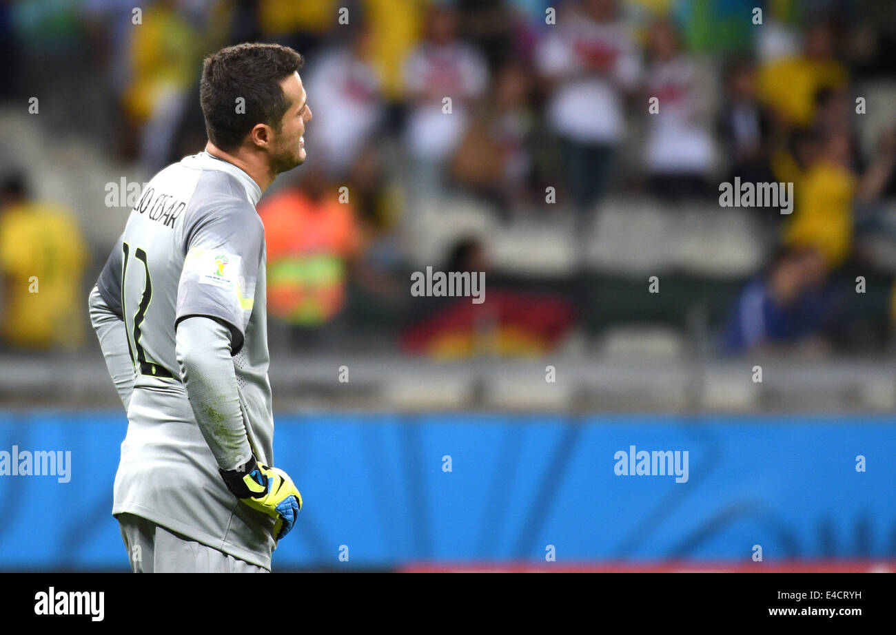 Belo Horizonte, Brazil. 8th July, 2014. Brazil's goalkeeper Julio Cesar reacts during a semifinal match between Brazil and Germany of 2014 FIFA World Cup at the Estadio Mineirao Stadium in Belo Horizonte, Brazil, on July 8, 2014. Germany won 7-1 over Brazil and qualified for the final on Tuesday. Credit:  Li Ga/Xinhua/Alamy Live News Stock Photo