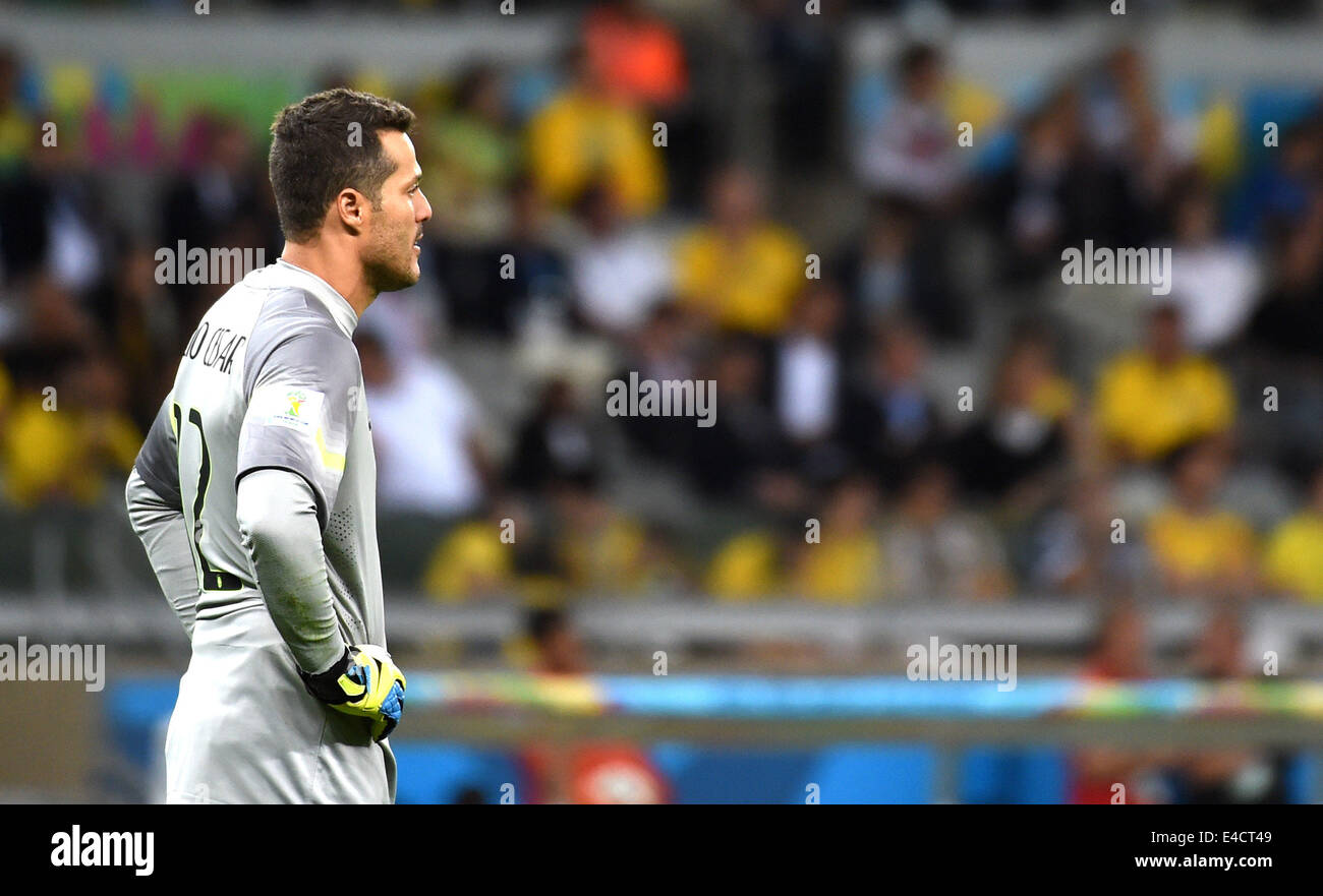 Belo Horizonte, Brazil. 8th July, 2014. Brazil's goalkeeper Julio Cesar reacts during a semifinal match between Brazil and Germany of 2014 FIFA World Cup at the Estadio Mineirao Stadium in Belo Horizonte, Brazil, on July 8, 2014. Germany won 7-1 over Brazil and qualified for the final on Tuesday. Credit:  Li Ga/Xinhua/Alamy Live News Stock Photo