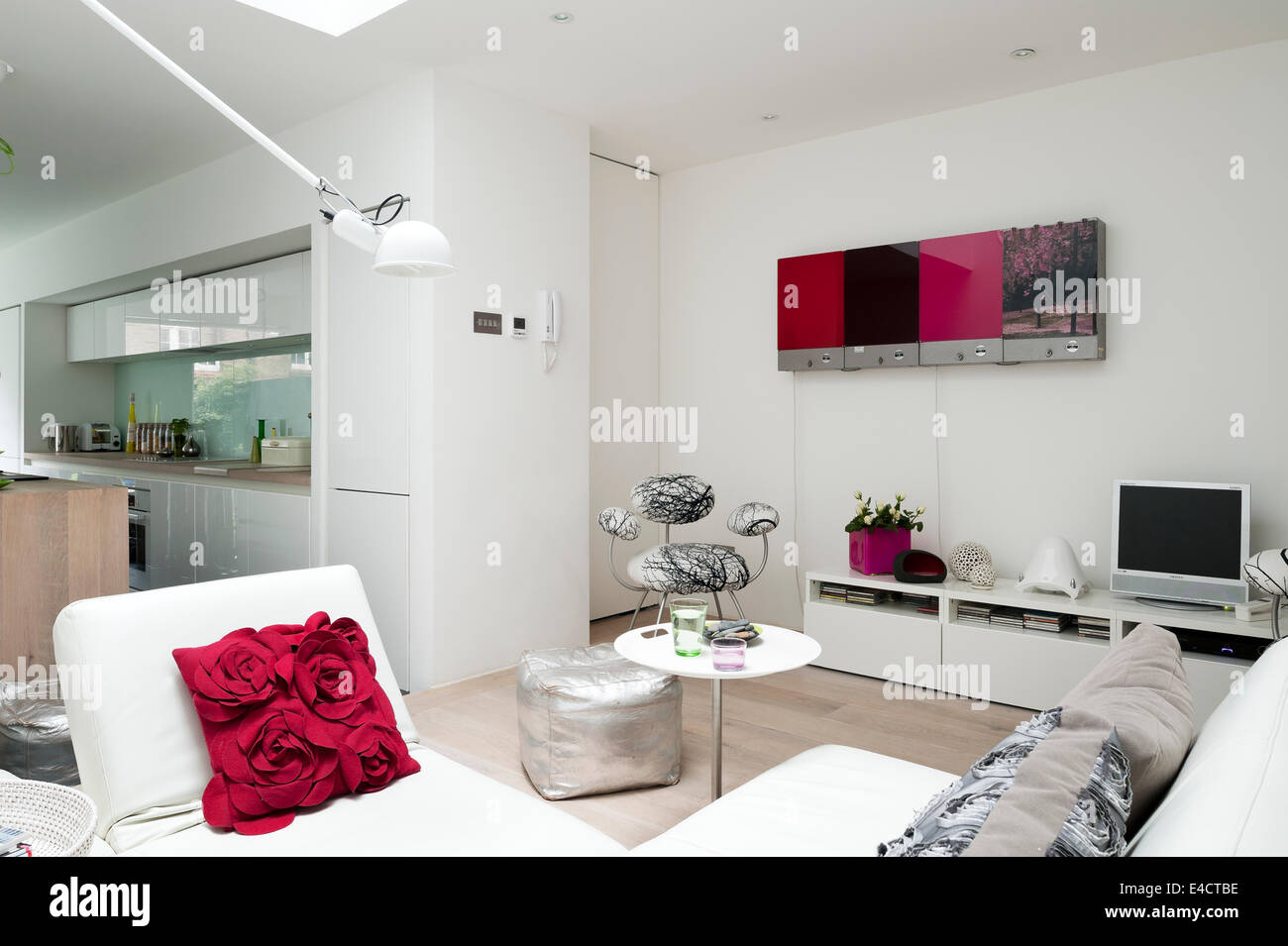 White modular Edra sofas in open plan kitchen living space. The Kitchen