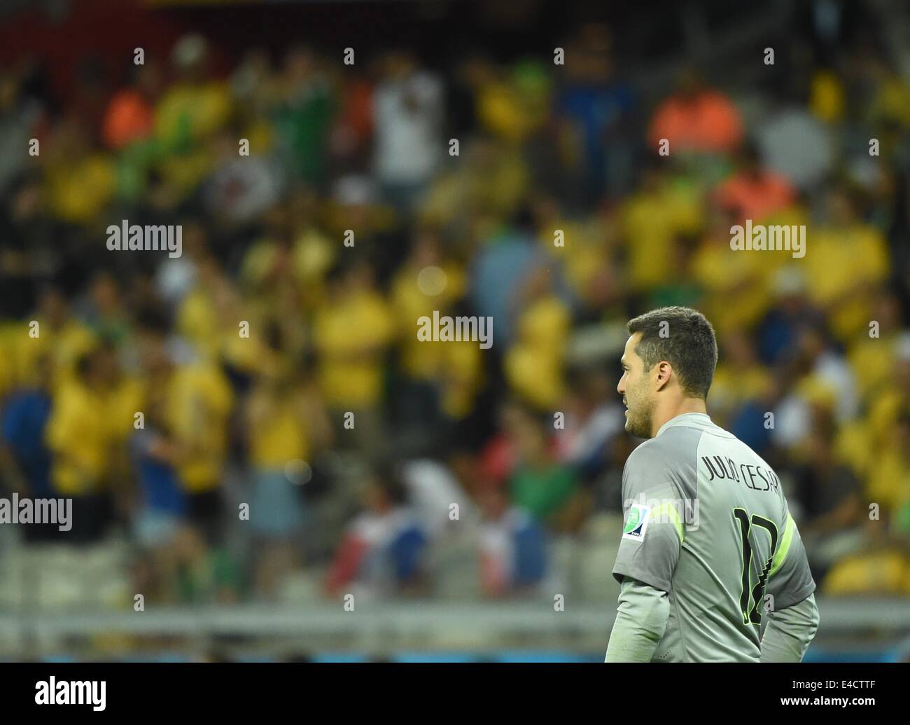 Belo Horizonte, Brazil. 8th July, 2014. Brazil's goalkeeper Julio Cesar looks on during a semifinal match between Brazil and Germany of 2014 FIFA World Cup at the Estadio Mineirao Stadium in Belo Horizonte, Brazil, on July 8, 2014. Germany won 7-1 over Brazil and qualified for the final on Tuesday. Credit:  Liu Dawei/Xinhua/Alamy Live News Stock Photo
