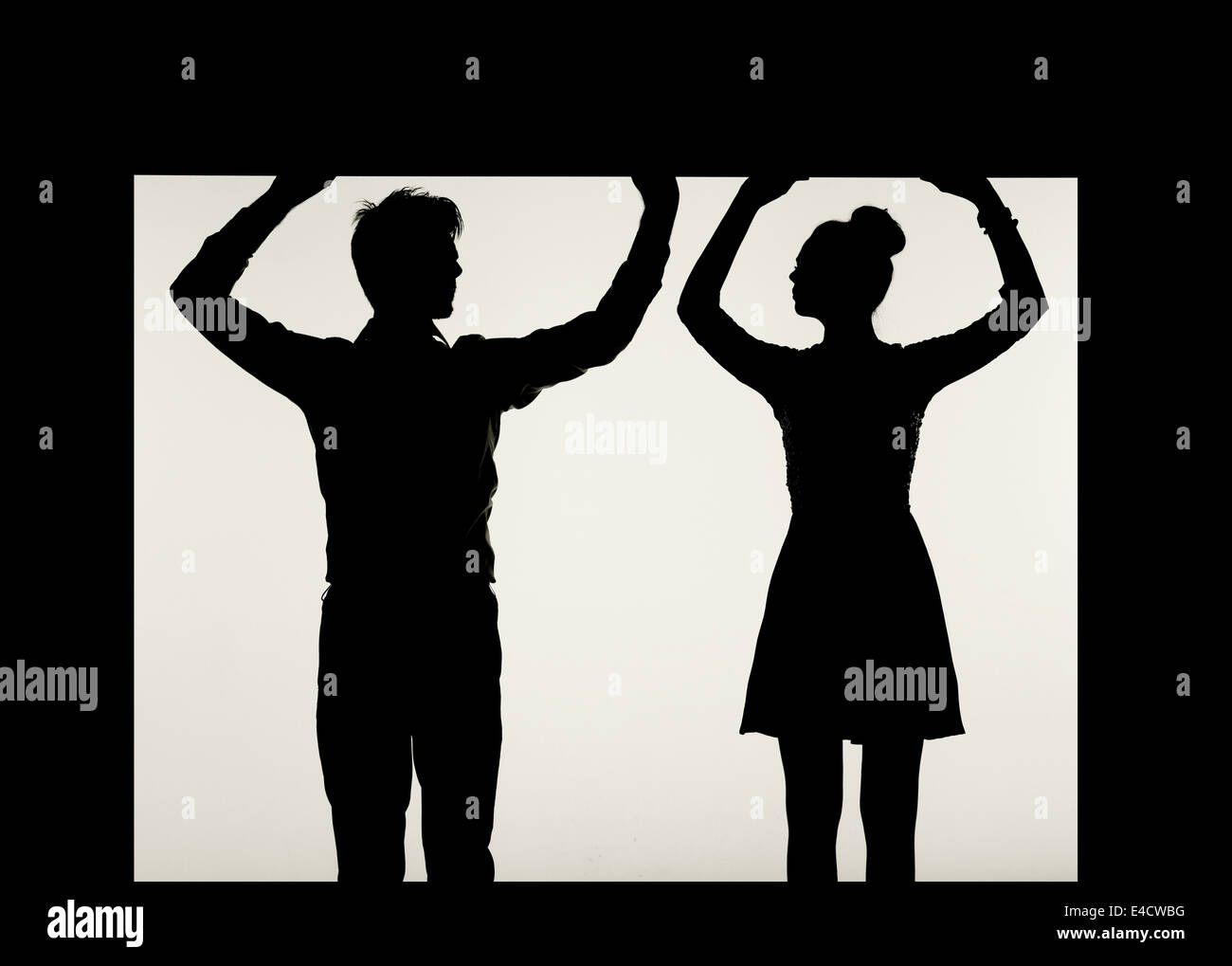 Black silhouette romantic couple holding hi-res stock photography and ...