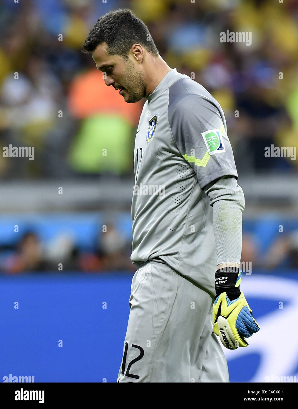 Belo Horizonte, Brazil. 8th July, 2014. Brazil's goalkeeper Julio Cesar reacts during a semifinal match between Brazil and Germany of 2014 FIFA World Cup at the Estadio Mineirao Stadium in Belo Horizonte, Brazil, on July 8, 2014. Germany won 7-1 over Brazil and qualified for the final on Tuesday. Credit:  Qi Heng/Xinhua/Alamy Live News Stock Photo