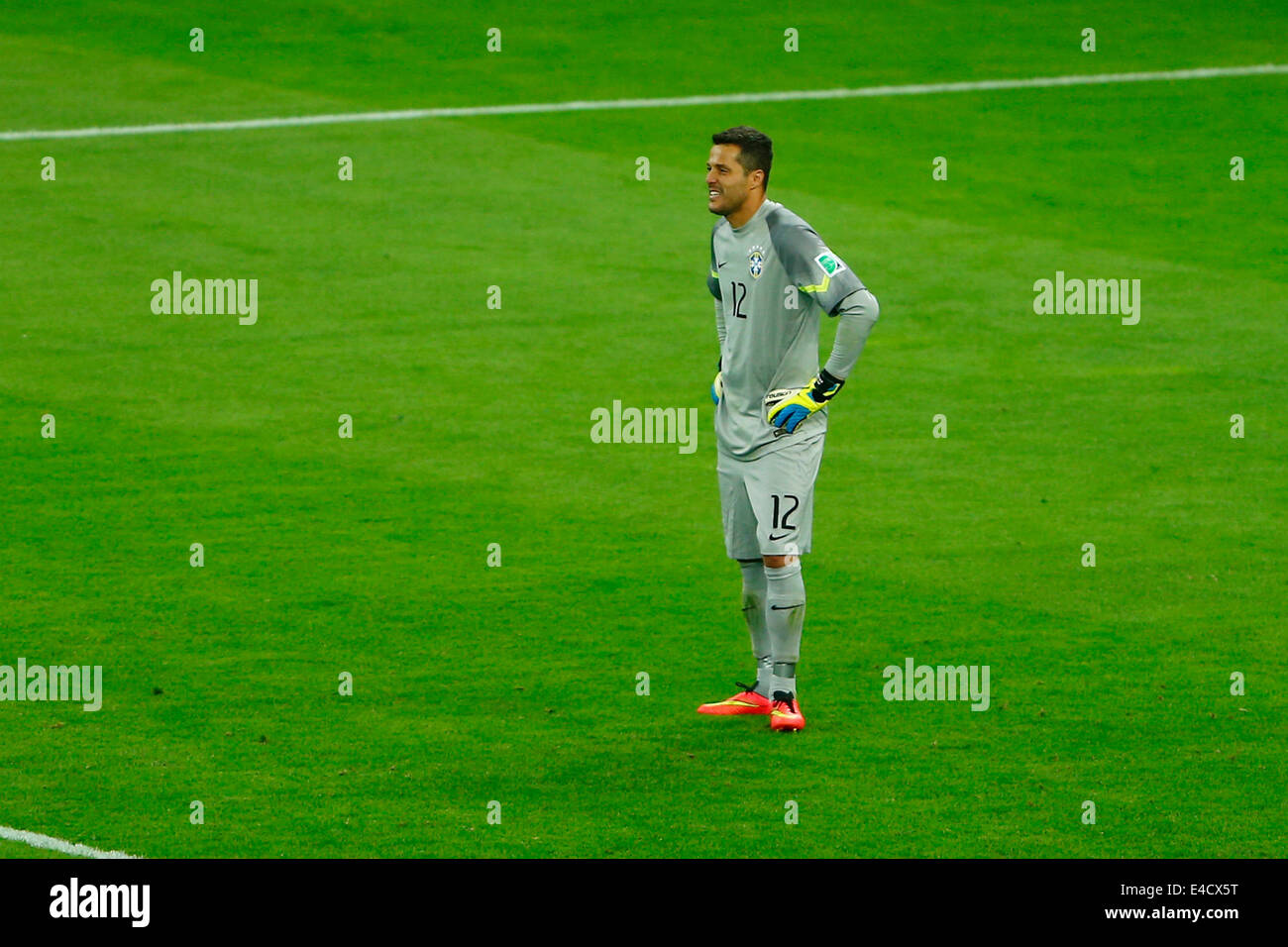 Belo Horizonte, Brazil. 8th July, 2014. Brazil's goalkeeper Julio Cesar reacts after a semifinal match between Brazil and Germany of 2014 FIFA World Cup at the Estadio Mineirao Stadium in Belo Horizonte, Brazil, on July 8, 2014. Germany won 7-1 over Brazil and qualified for the final on Tuesday. Credit:  Liu Bin/Xinhua/Alamy Live News Stock Photo