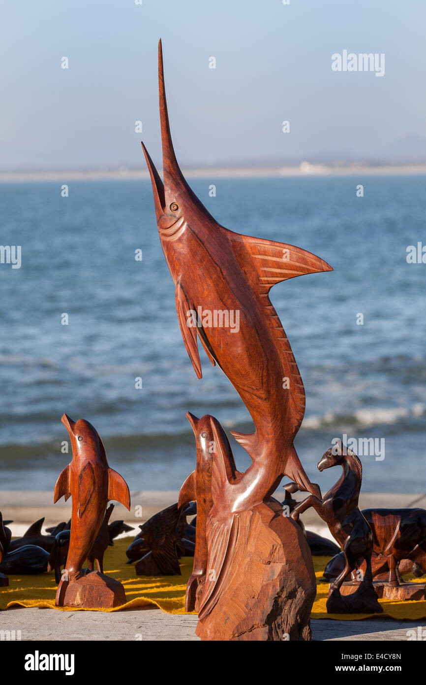 Ironwood carvings for sale at Cerritos Beach in Mazatlan, Sinaloa, Mexico. Stock Photo