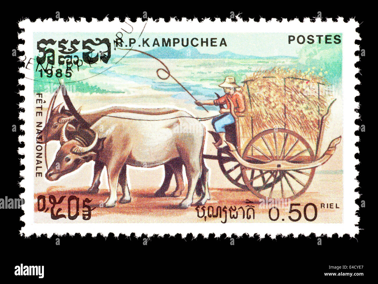 Postage stamp from Cambodia depicting an oxcart. Stock Photo
